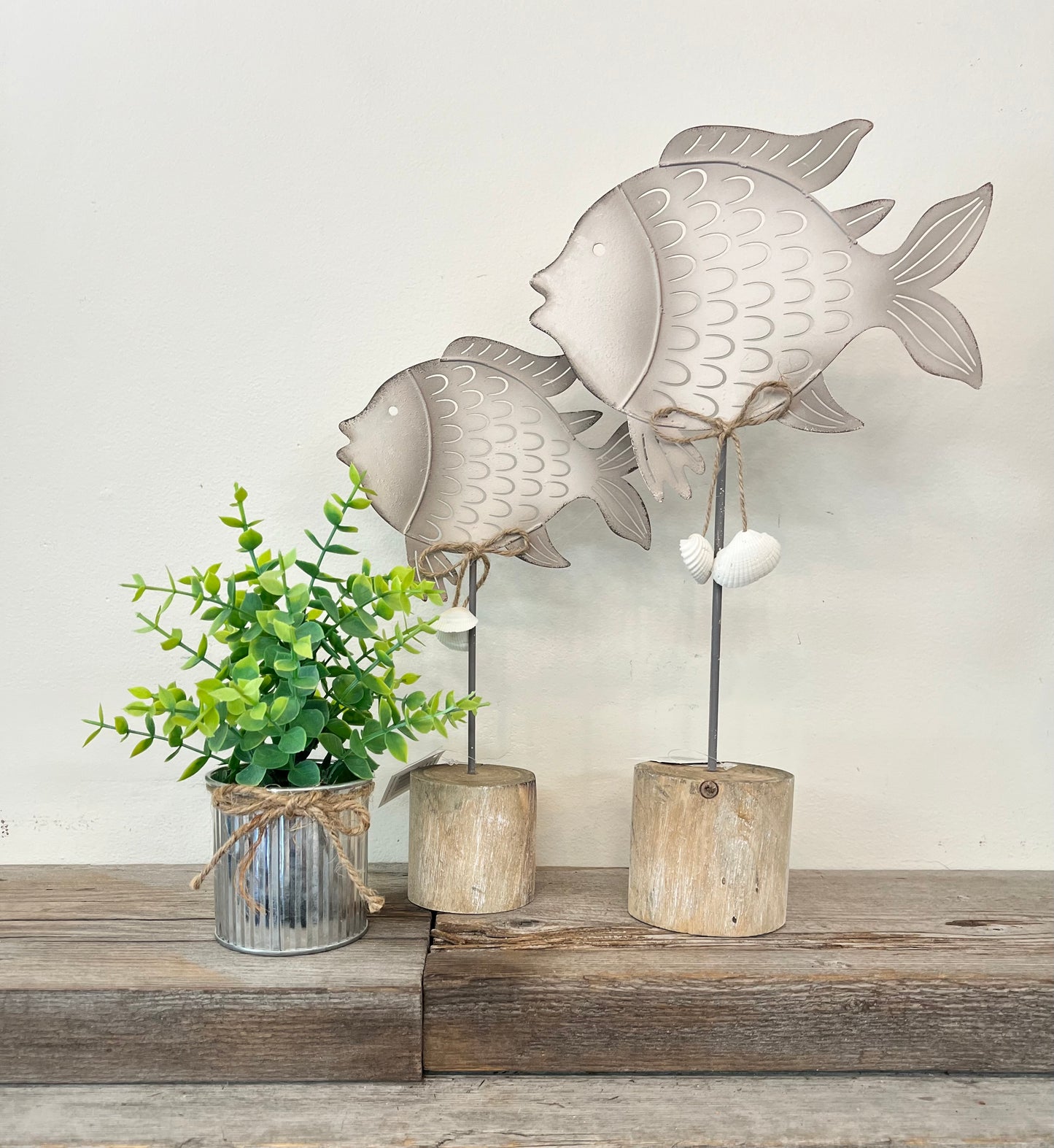 Fish (Metal) on Wooden Stumps