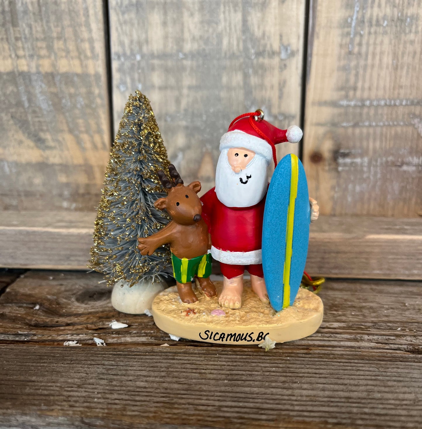 “Surfboard/Reindeer” Santa Ornament