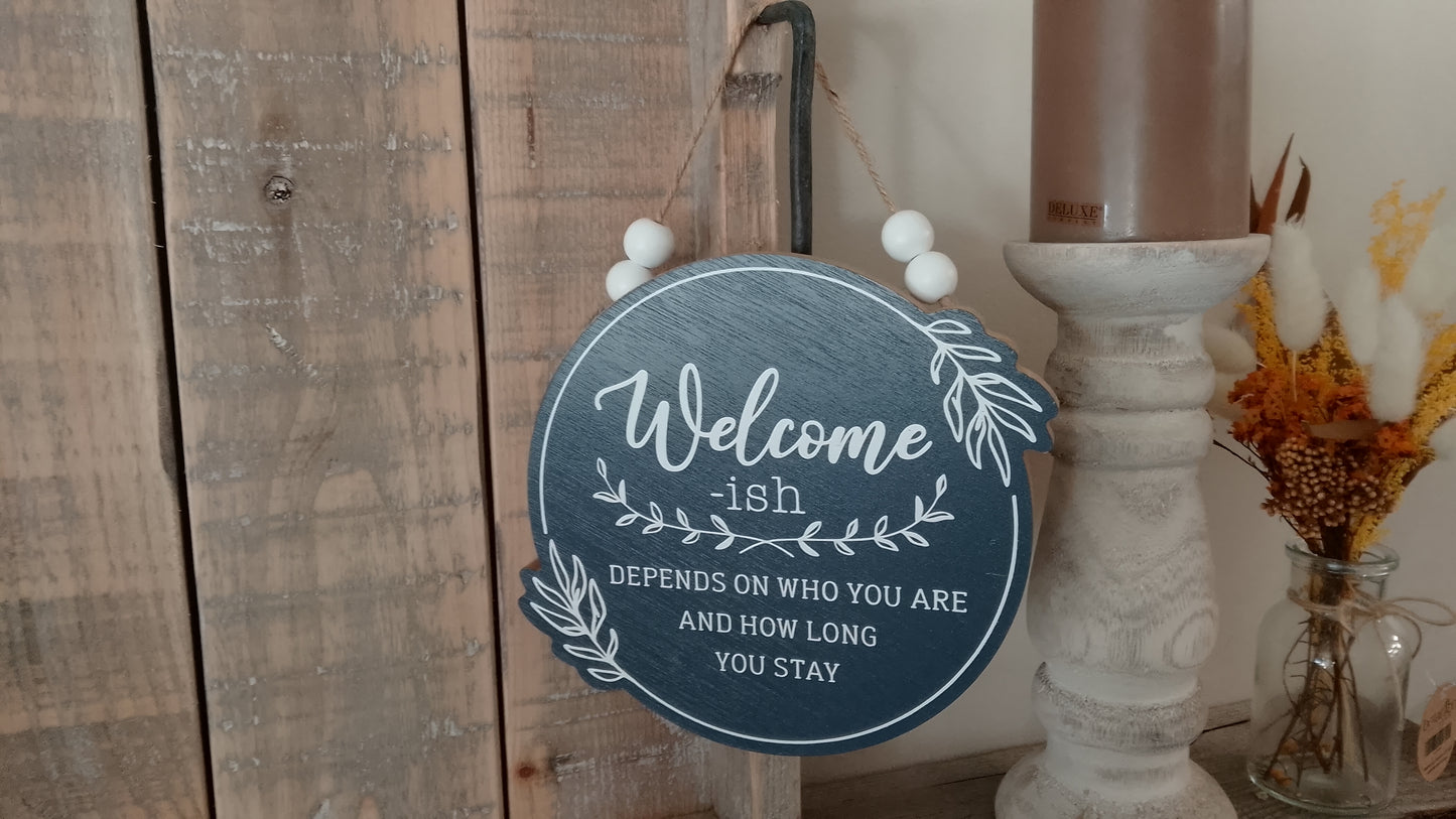 Welcome-ish blue hanging sign